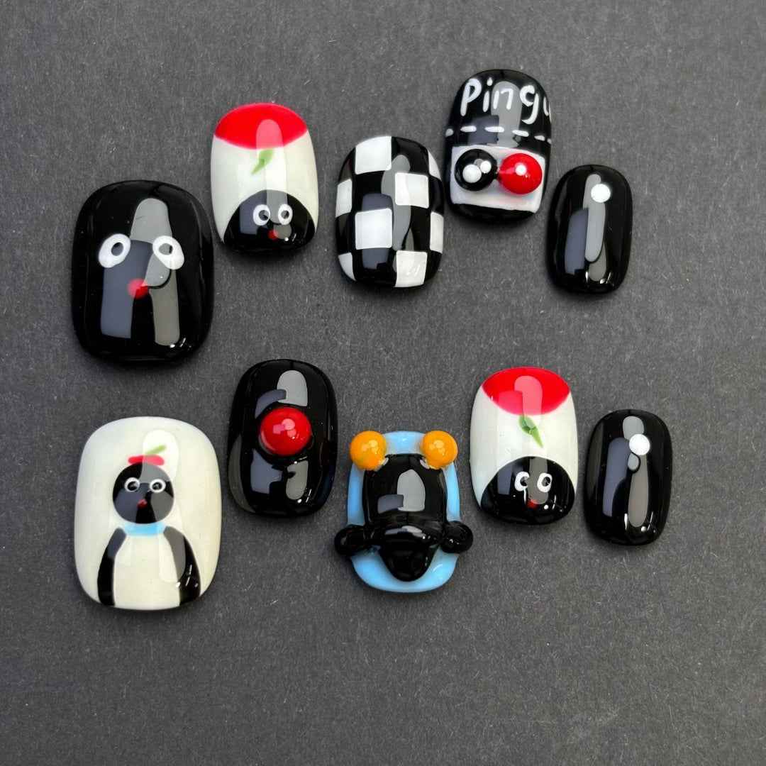 chilly penguin - cute short oval black handmade press on nails
