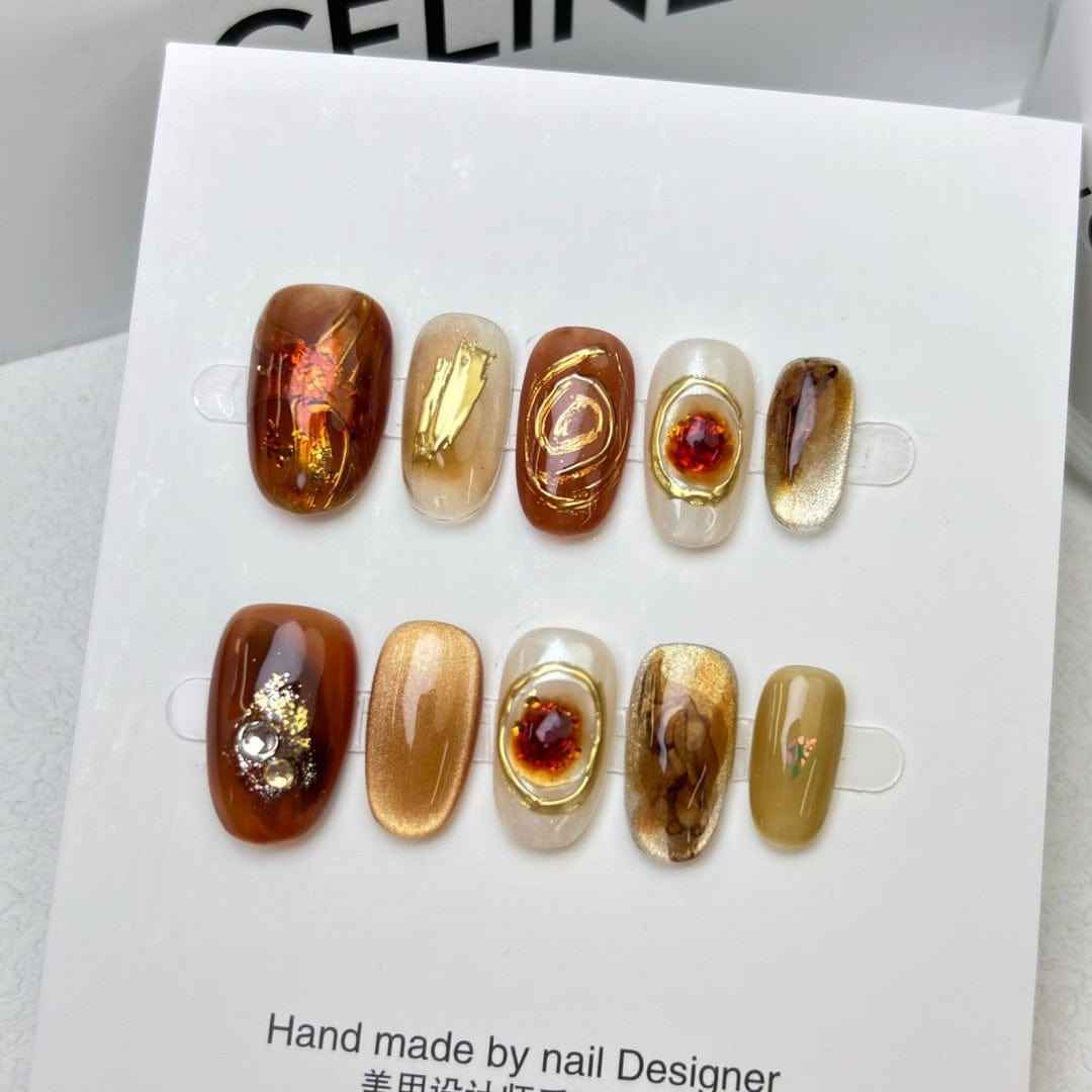 saturn trails - elegant long oval brown handmade press on nails