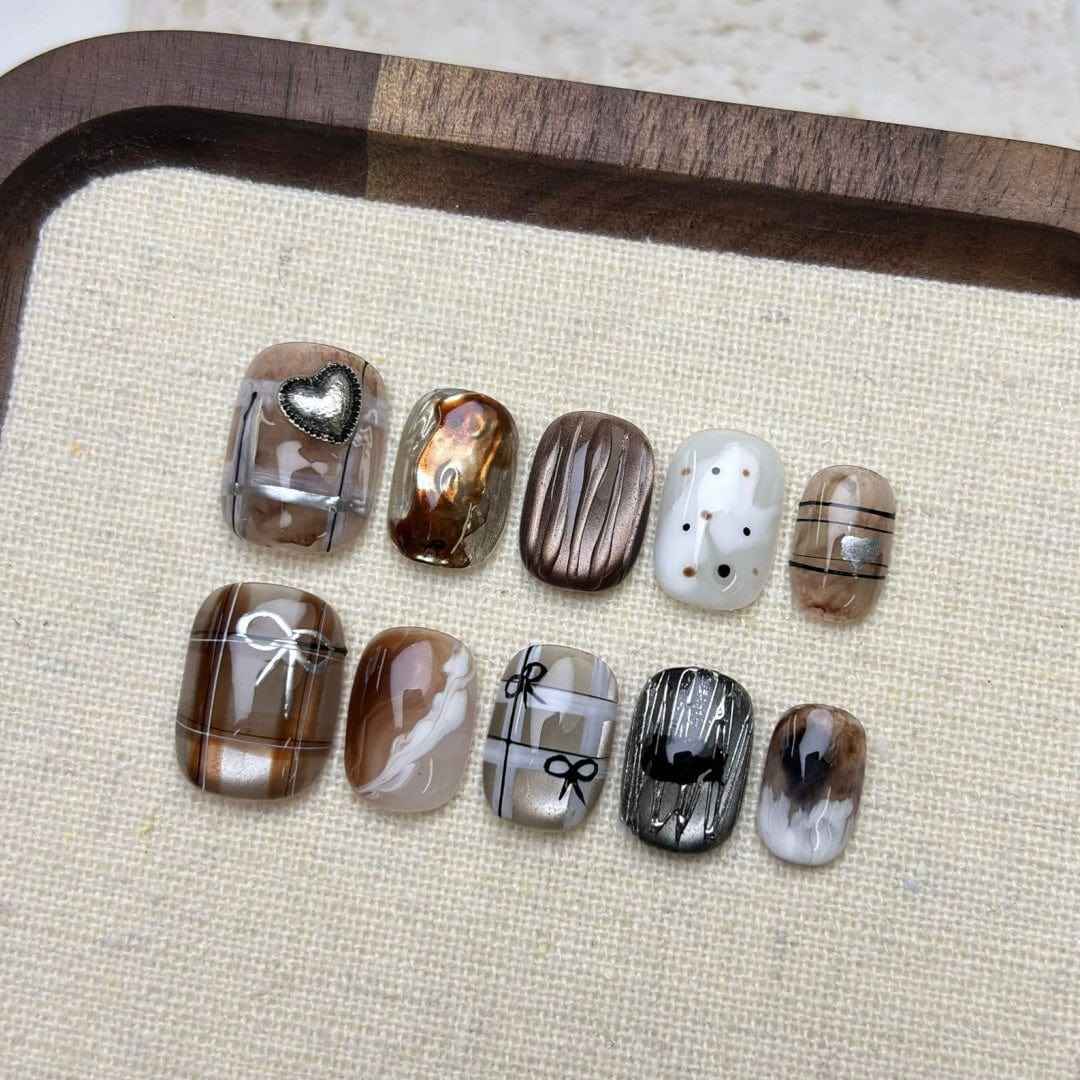 parisian reverie - elegant short oval brown handmade press on nails