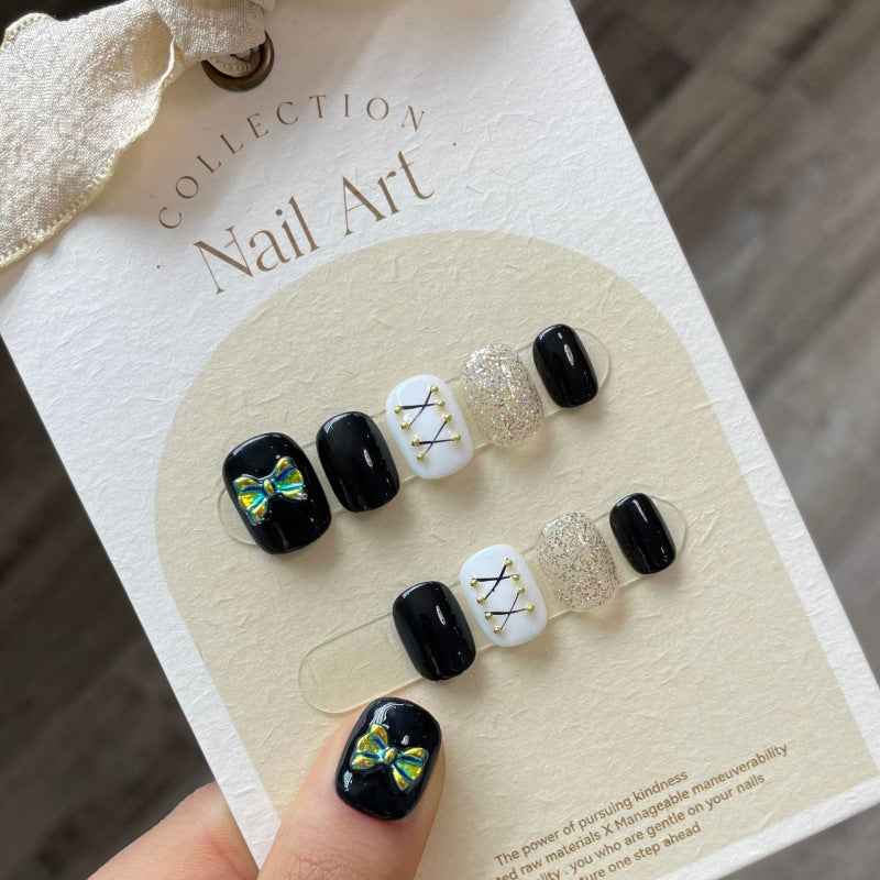 wings of night - elegant short oval black handmade press on nails