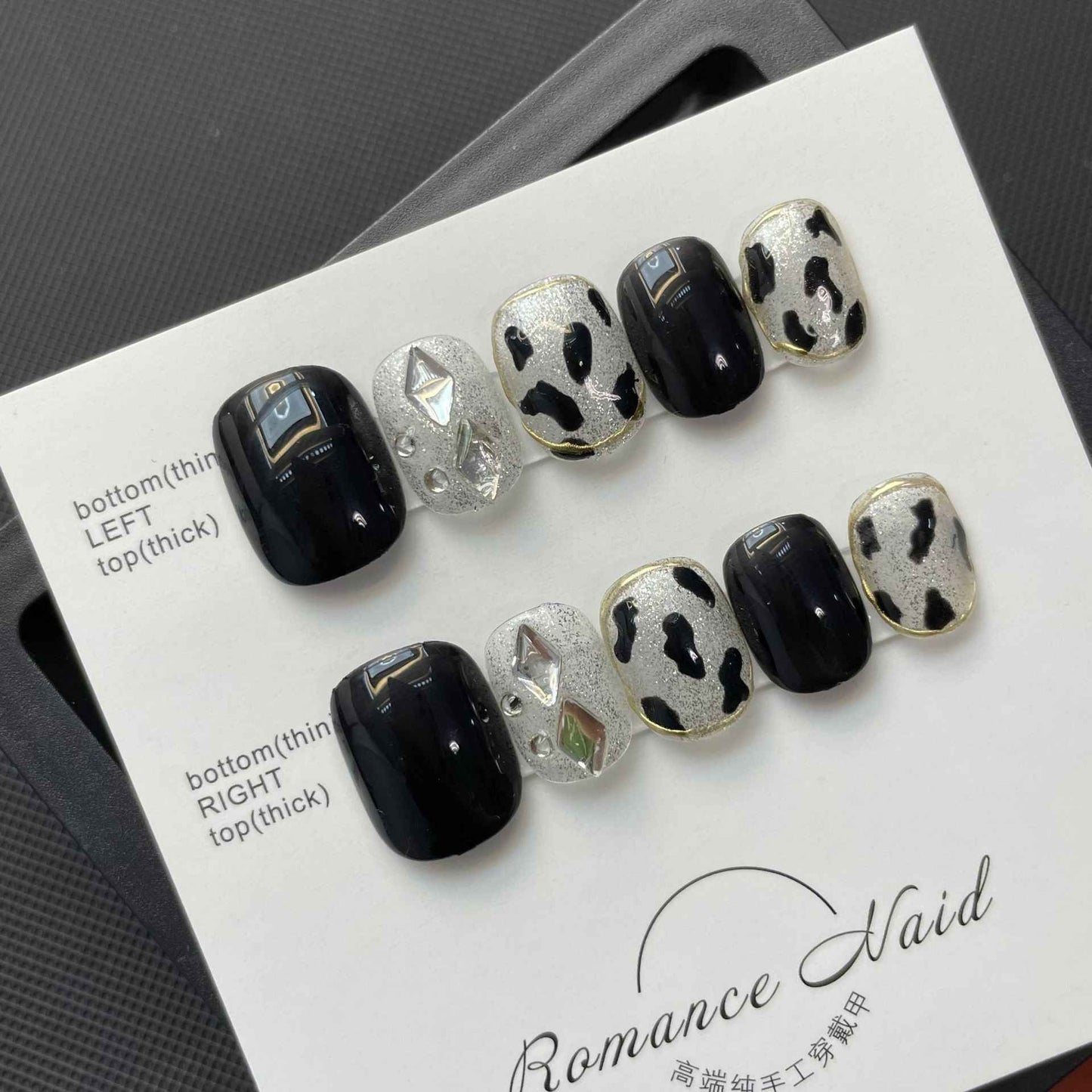 midnight speckle - cool short oval black handmade press on nails