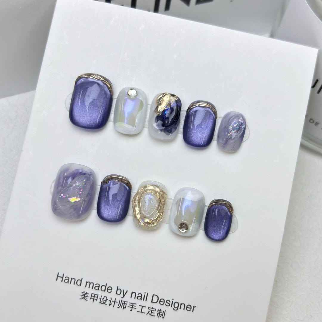 ocean reverie - elegant short oval blue handmade press on nails