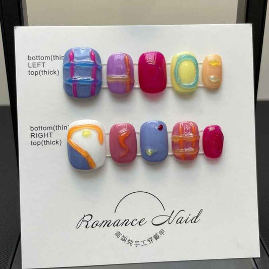 candy swirl delight - cute short oval blue handmade press on nails